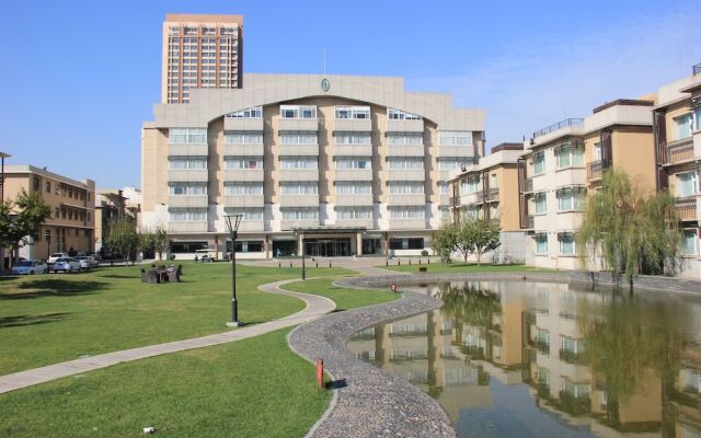 GreenPark Hotel Tianjin Тяньцзинь вид на фасад