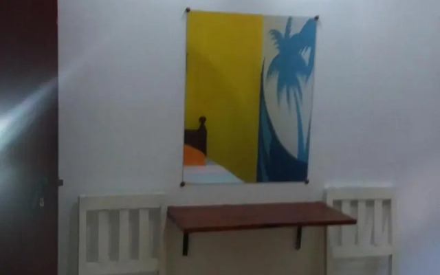 Malika's Yellow House