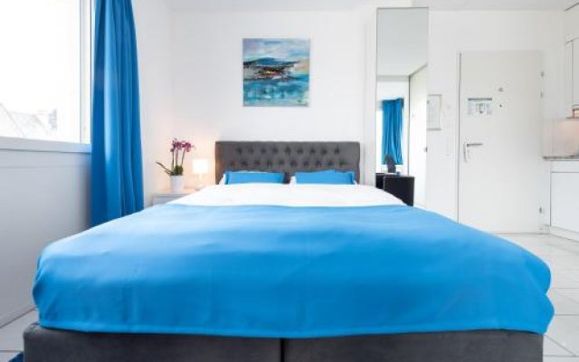 Отель Iq130 Apartment Hotel Швейцария, Цюрих - отзывы, цены и фото номеров - забронировать отель Iq130 Apartment Hotel онлайн комната для гостей