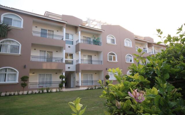 Отель Residencial Las Buganvillas Bavaro Доминикана, Пунта Кана - отзывы, цены и фото номеров - забронировать отель Residencial Las Buganvillas Bavaro онлайн вид на фасад