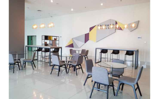 Studio Apartment next to Mall at Supermall Mansion By Travelio