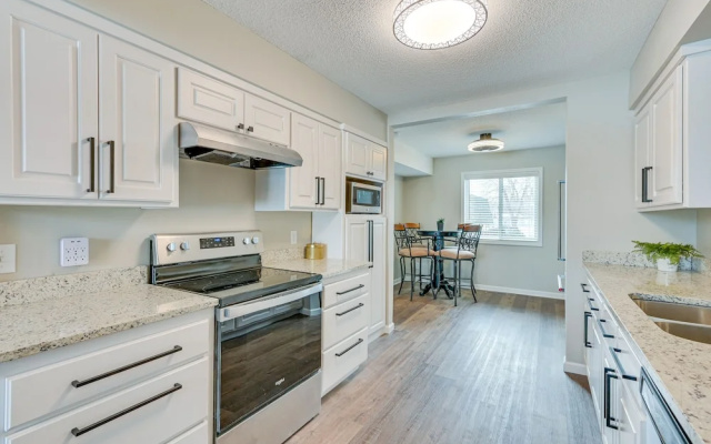 Riverfront Champlin Townhome w/ Deck & Water View!