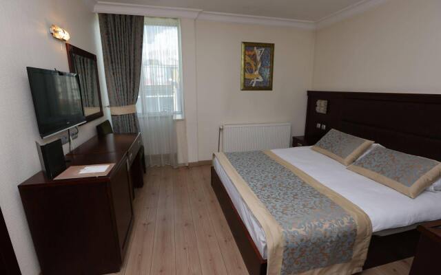 Grand Saatcioglu Otel Турция, Аксарай - отзывы, цены и фото номеров - забронировать отель Grand Saatcioglu Otel онлайн комната для гостей