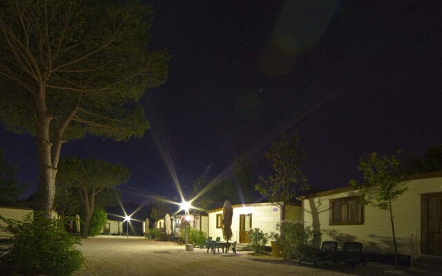 Отель Flaminio Village Bungalow Park вид на фасад