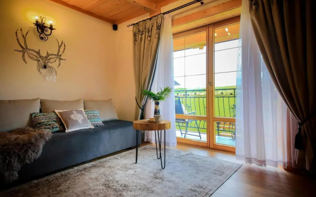 Folk Resort Domki i Apartamenty