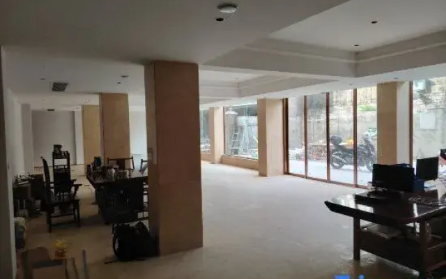 Haikou Zhouren Apartment (Wanda Plaza Convention and Exhibition Center)
