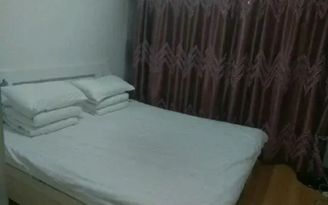 Benxi Huamu Hefu Warm Apartment
