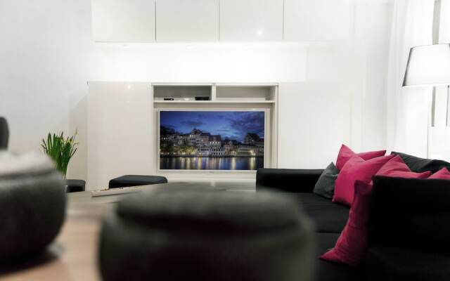 Апартаменты Boutique Apartment Stadium Letzigrund комната для гостей
