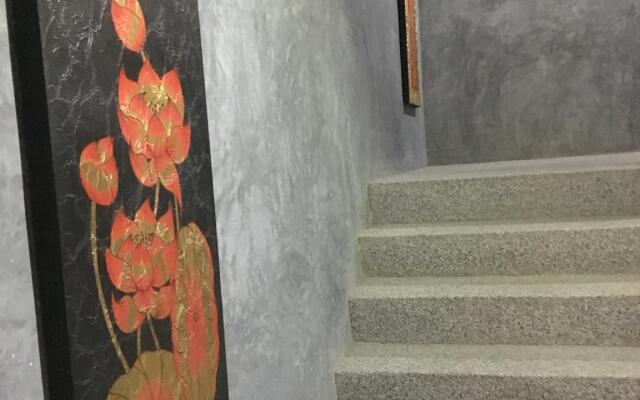 Taosha Suites Hotel вид на фасад