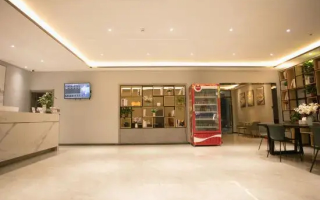Home Inn Huaxuan Hotel Select (Zhoukou Taifuling Branch)
