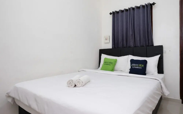 Urbanview Hotel Arta Guna Casa