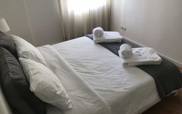 Апартаменты Saldanha Residence Apartments комната для гостей
