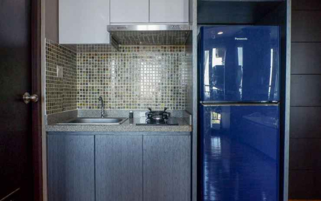 Spacious & Exquisite 1BR Apartment at Tamansari Papilio By Travelio