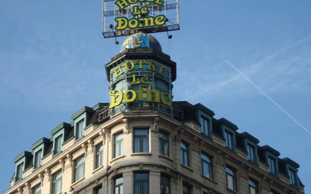 Hotel Le Dome вид на фасад