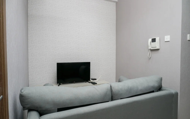 Cozy 1BR at Puri Orchard Apartment