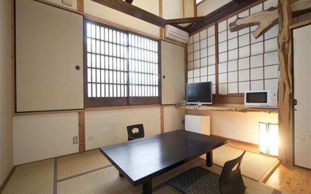 Отель Kannawa Onsen Zekkei no Yado Sakuratei Беппу комната для гостей