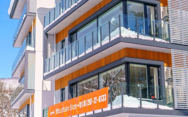 Отель Mountainside Hakuba Хакуба вид на фасад