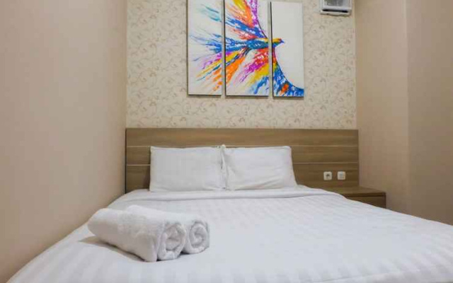 Cozy 2BR Green Pramuka Apartment By Travelio