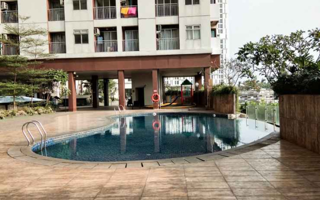Bright and Clean Studio Apartment Serpong Greenview By Travelio
