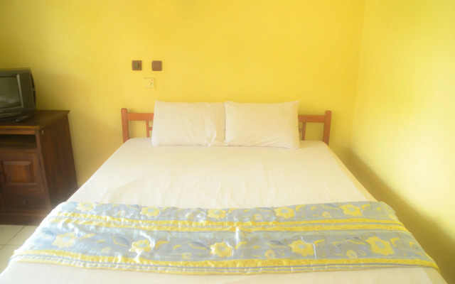 Super OYO 1654 Maha Bharata Kuta Inn