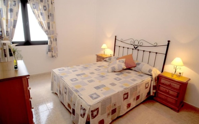 Отель Cala Apartments 3Pax Bajo A Испания, Гинигинамар - отзывы, цены и фото номеров - забронировать отель Cala Apartments 3Pax Bajo A онлайн комната для гостей