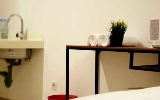 Alpine Room at TreePark City Apartemen