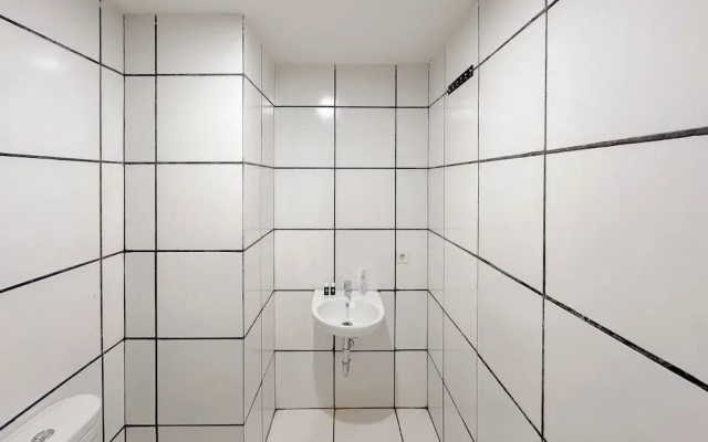 Combined Grey Toned 2Br Apartment At The City Square Surabaya