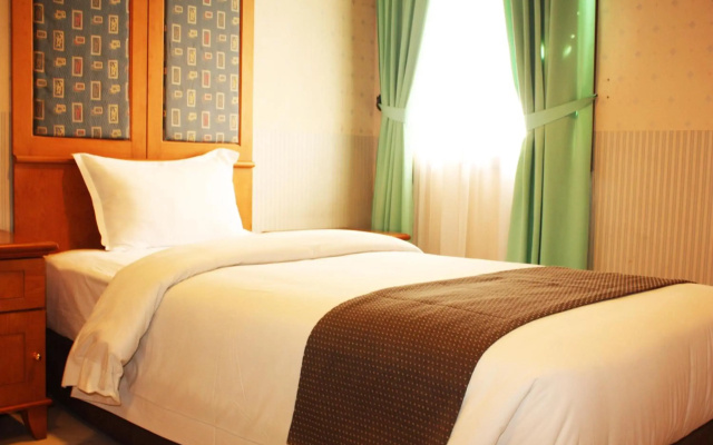 Travellers Suites Serviced Apartments