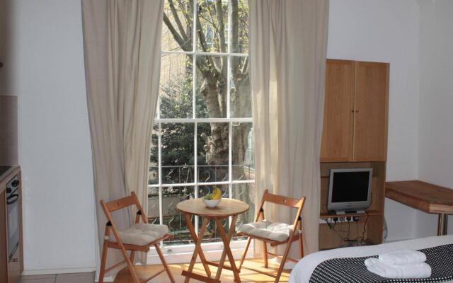 Отель Studios 2 Let Serviced Apartments - Cartwright Gardens Великобритания, Лондон - отзывы, цены и фото номеров - забронировать отель Studios 2 Let Serviced Apartments - Cartwright Gardens онлайн комната для гостей