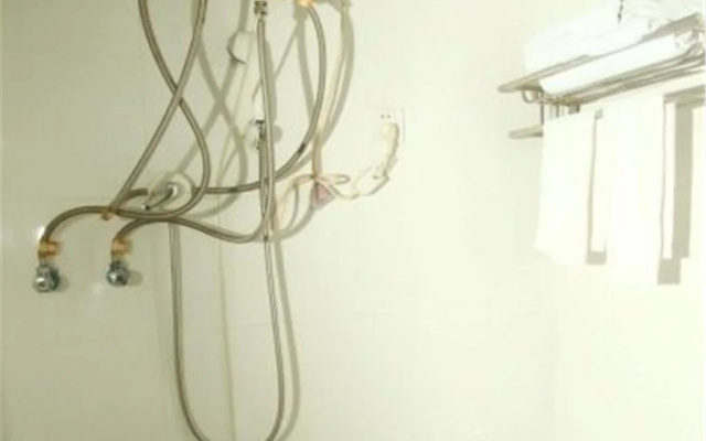 Tengchong Hongxing Hostel