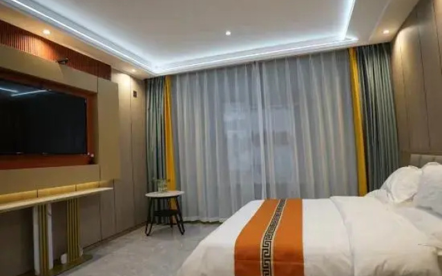 Guyuan Woju Apartment Hotel