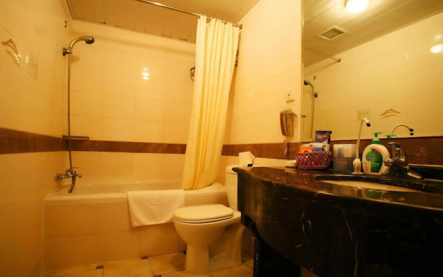 HuaJun Suite Hotel