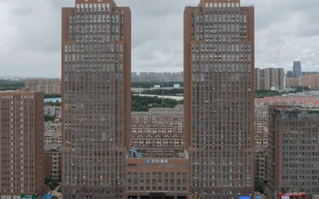 Ni Hao Hotel (Changchun Huizhan Zhongxin Motian Huoli Cheng)