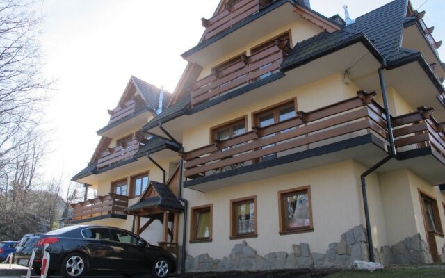 Отель Apartamenty Pod Skocznia Закопане вид на фасад