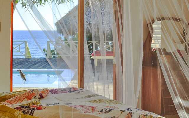 Отель The Pelican Three Bedroom Villa Треже-Бич ванная