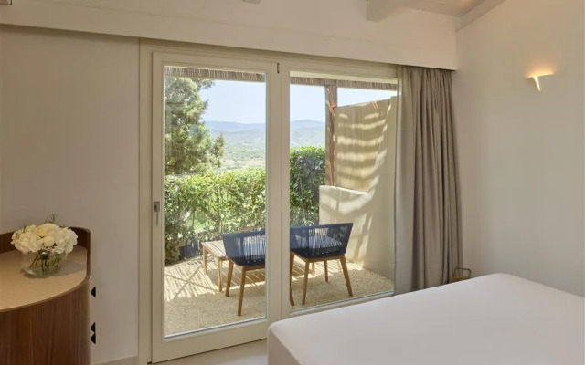 Baia di Chia Resort Sardinia, Curio Collection by Hilton