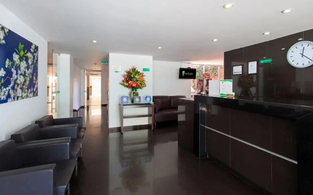 122 Plaza Apartahotel