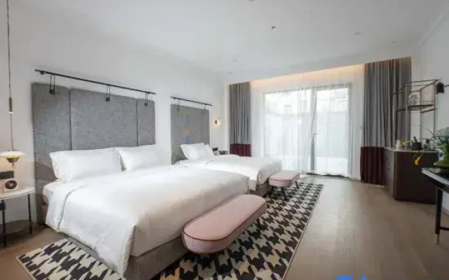 Yanguan Chaolezhicheng Shuishi Hotel