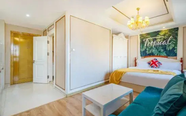 Ganghui Four Seasons Hotel Apartment (Dalian Railway Station Zhongshan Square)