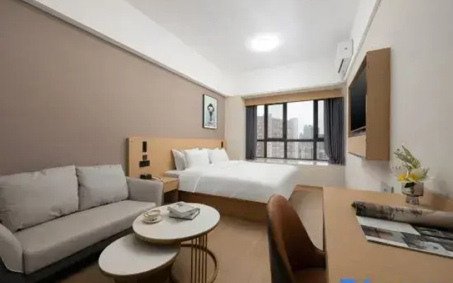 Yunxuan Hotel (East Aru Shangcheng Plaza Bus Station)