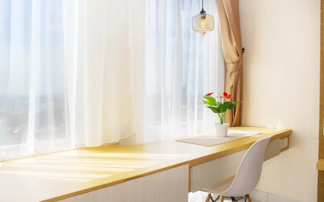 Comfortable Patraland Urbano Studio Apartment Near Train Station