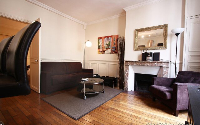 Апартаменты Bridgestreet Montparnasse Service Apartments Париж комната для гостей