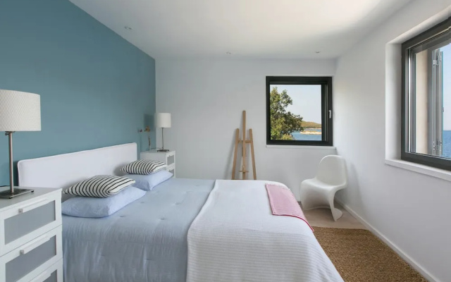 Beachfront Villa Poseidon with Heated Pool