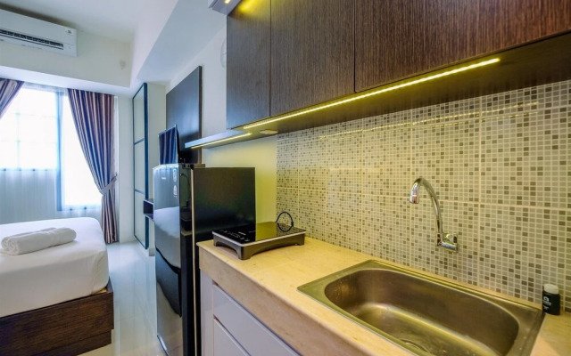 Cozy Stay and Tidy Studio at Evenciio Margonda Apartment