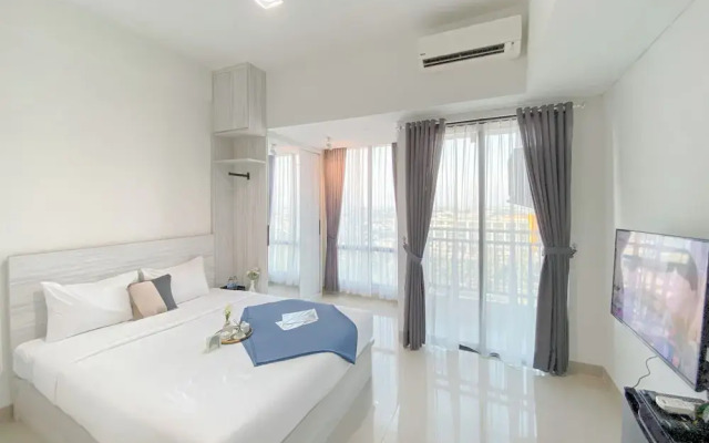 Simple White Designed Studio At Lrt City Bekasi Apartment