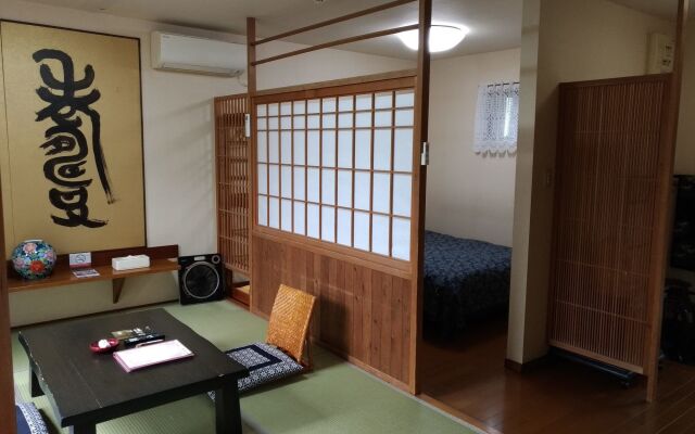 Отель Oita Ken·Yufuin Onsen Oyado Gorinka Хидзи комната для гостей