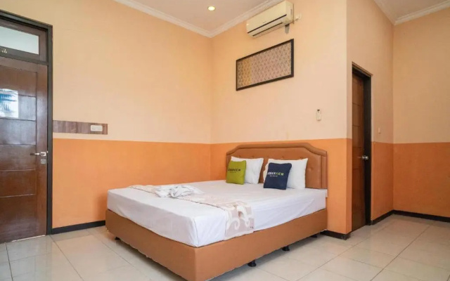 Urbanview Hotel De Kopen Malang By Reddoorz