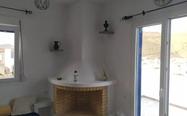 Cycladic house with a stunning view