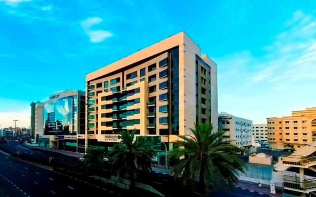 Nojoum Hotel Apartments вид на фасад