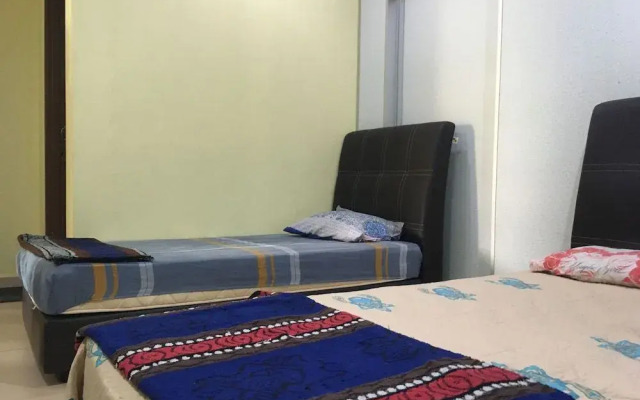 SPOT ON 89857 Azra Inn Rumah Tumpangan